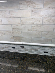 Marble subway with brick mosaic